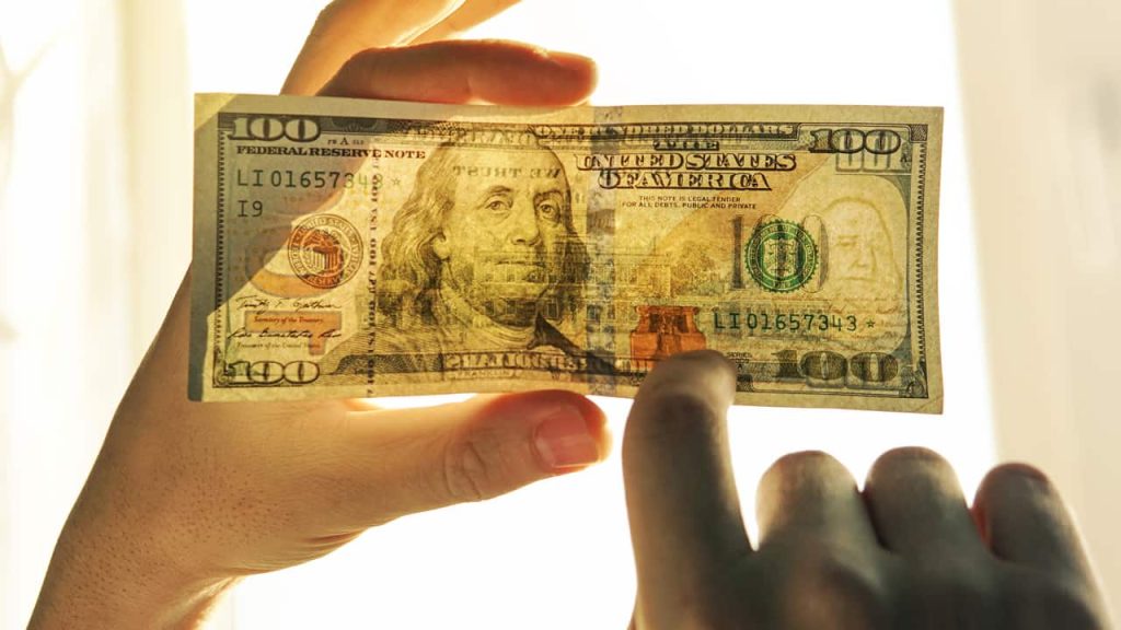 تشخیص دلار تقلبی از دلار اصلی